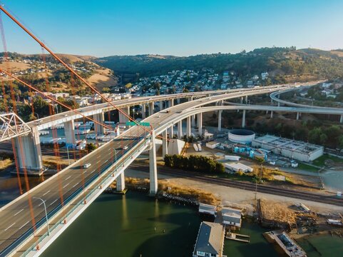 An aerial view shows the Alfred Zampa Memorial Bridge in California, USA, carrying cars and trucks across the Carquinez Strait, connecting Contra Costa and Solano counties.