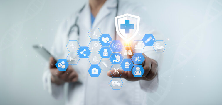 Modern medical professional interacts with a digital touchscreen interface displaying healthcare icons, symbolizing futuristic diagnostics, data analysis and digital health innovation