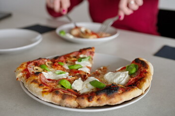 Piece of homemade pizza on the plate