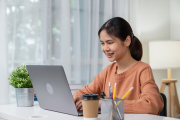 Woman hand using laptop and type on the keyboard.