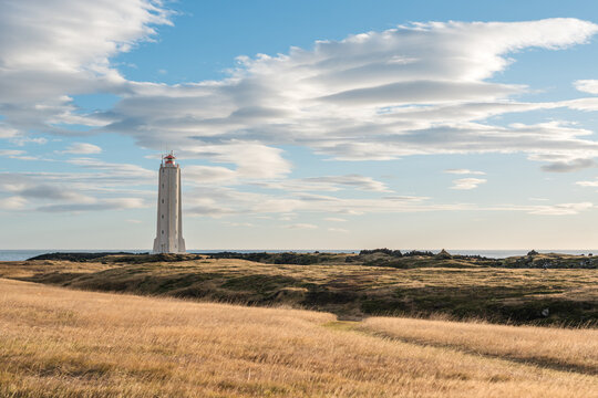 Scenic view of lenticular clouds over Malarrif Lighthouse in Iceland