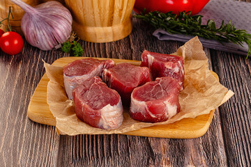 Fresh raw pork meat medallions