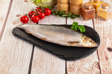Raw whole salted herring fish