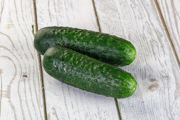 Ripe green raw two cucumbers