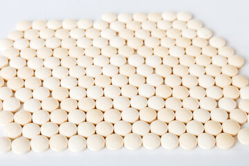 Many colorful pills top viev. Set of many pills on colored background