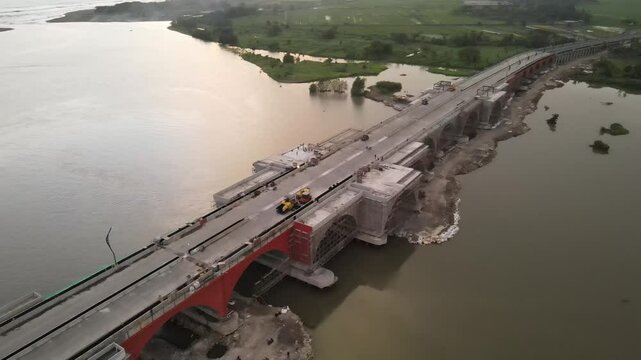 Aerial view of Pandansimo Bridge in Yogyakarta, the southern Java cross bridge is under construction. Adjacent to Baru Beach.