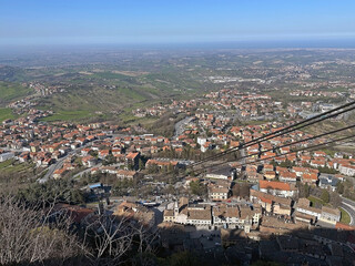 A cablecar overlooks Borgo Maggiore, San Marino, Europe
