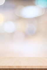 Empty wood table top, counter, desk background over blur  bokeh background, Wooden table, shelf and blurred kitchen restaurant for food, product display mockup, template