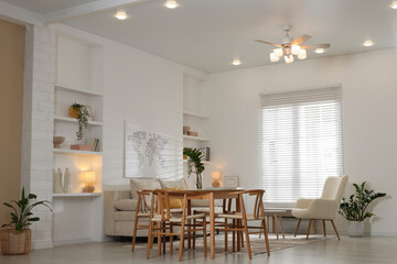 Beautiful furniture and decor in cozy living room. Interior design