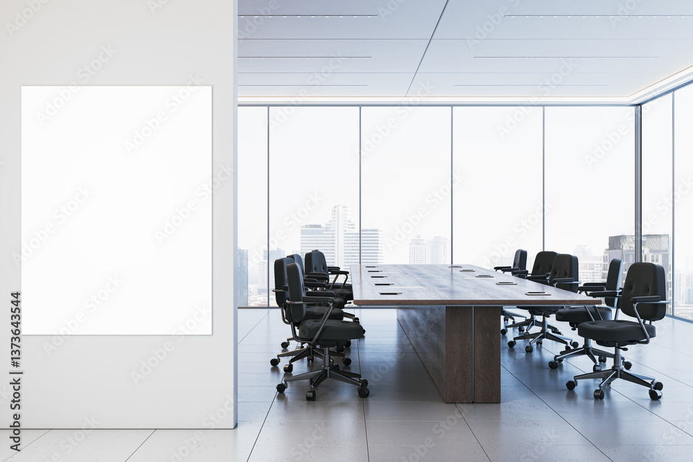 Poster modern conference room with large wooden table, black chairs, and empty white poster frame on the wa