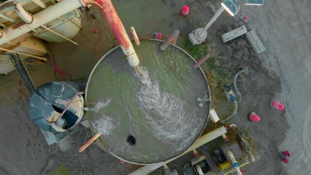 Water is pumped into settling pool to allow the sediment to settle before being recylced