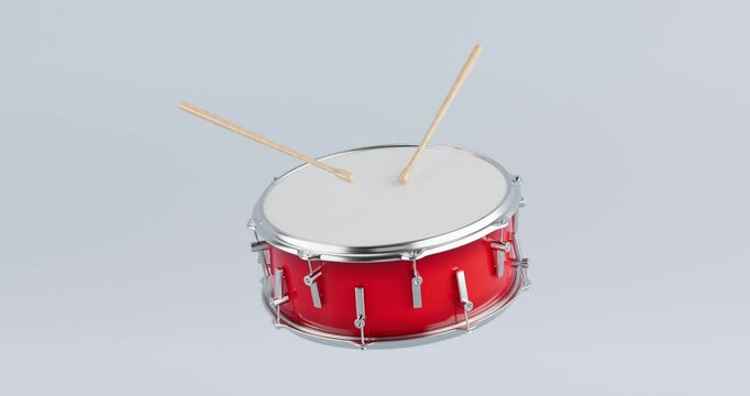 4k Resolution Video: Red Bass Drum with Pair of Drum Sticks Seamless Looped Moving on a white background with Alpha Matte