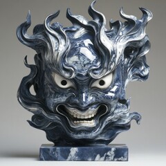 Fototapeta premium Artistic Mask Sculpture with Fiery Hair and Intense Expression