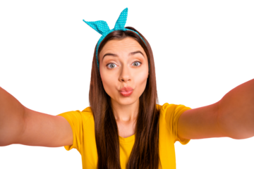 Close up photo of charming youth making photo wearing yellow t-shirt isolated over pink background