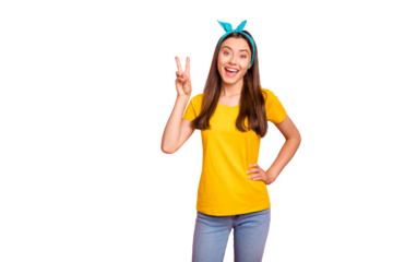 Portrait of lovely  youth laughing making v-signs wearing yellow t-shirt isolated over pink background
