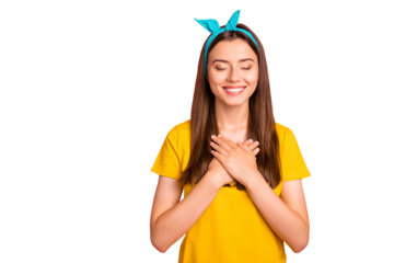 Portrait of cute hipster closing her eyes touching chest wearing yellow t-shirt isolated over pink background