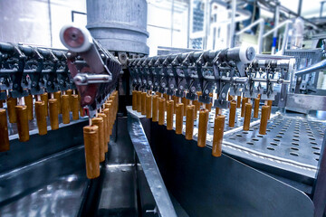 Food factory. Automatic production line of fruit ice cream