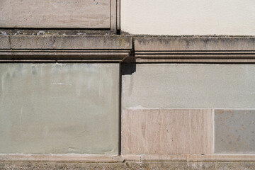 gros plan sur un mur de pierre et de molasse ancien