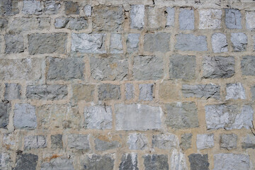 gros plan sur un mur de pierre ancien