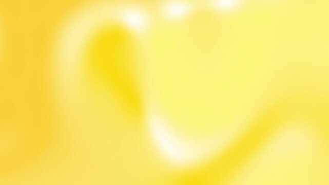 Dynamic video background of yellow gradient waves flowing and transitioning, creating sleek and liquid visual movement with soft, warm luminosity against minimalist design backdrop