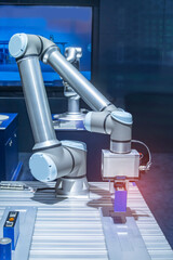 automatic robot arm at industrial manufacture factory of lithium battery