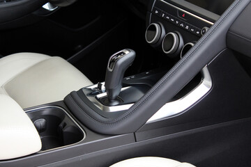 New SUV gear stick. Automatic gearbox. Automatic gear shifter. Car detailing. Automatic...