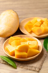 Cube mango on wooden plate ready to eating, Tropical fruit in summer season