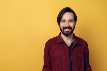 Fototapeta premium Portrait of Young Smiling Bearded Man