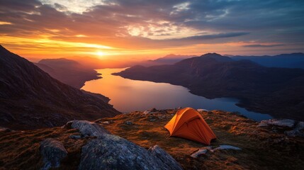 A vibrant orange tent set on a rugged mountaintop, overlooking a serene lake and dramatic mountain ranges during a colorful sunset, evoking adventure and tranquility.. AI Generation