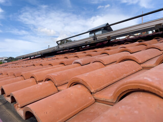 Clay Roof Tiles Under Blue Sky In Kaş, Turkey, Captured In Spring, Concept Of Architecture, Traditional Housing, Real Estate, Eco Building, Sustainability And Mediterranean Style