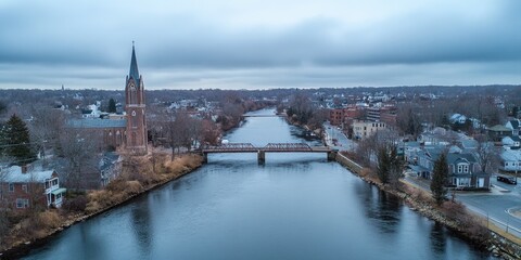 Fototapeta premium Pawtucket Rhode Island Aerial View with Overcast Skies and Seekonk River Bridge