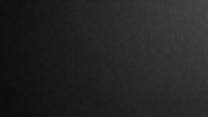 Minimalist black textured background offering a sleek and modern aesthetic for digital and print use.