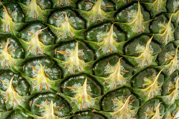 Fototapeta premium Background concept,Pineapple skin: Nature’s geometric art The beauty of patterns in nature,The art of pineapple skin