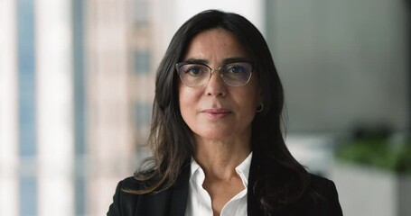 Diversity. Changing faces of different generations, race, complexion and professions men and women posing indoors, smiling, looking at camera, exuding self-assurance and success, head shot portraits