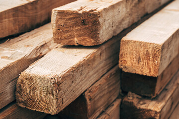 Pile of stacked constriction timber wood on a site