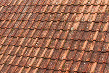 Old worn roof tile pattern as background