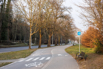 Pedestrian and bicycle paths with pedestrian crossing markings and signs.