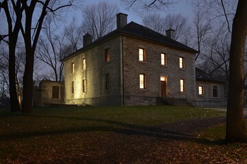 Haunting beauty of Battlefield House Museum at night in Hamilton
