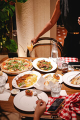 Charming and cozy interior of an Italian restaurant, featuring rustic decor and a warm, inviting atmosphere. © David