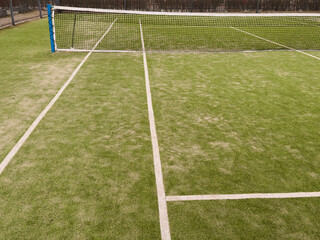 field of artificial grass tennis court 