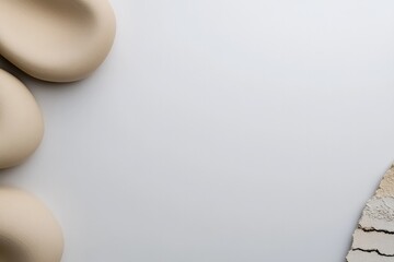 Soft, rounded shapes on smooth surface create calming, minimalis
