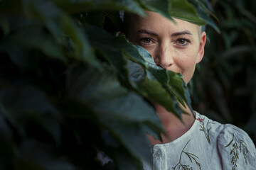 Beautiful young positive female cancer survivor smiling outdoors portrait. Life and health...