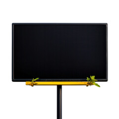 Obraz premium Blank billboard on a black background with minimal foliage detail.