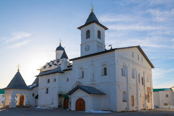 Church of the Intercession of the Holy Virgin with a refectory and a belfry on a sunny March morning. Trinity Complex of the Alexandro-Svirsky Monastery. Leningrad region, Russia