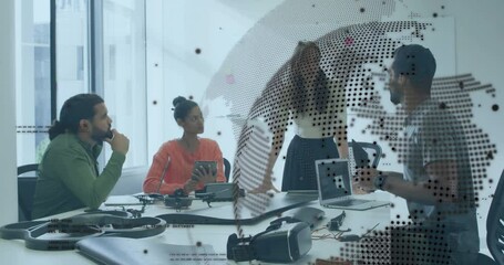 Collaborating in office, diverse team using animation with digital globe and data - Powered by Adobe