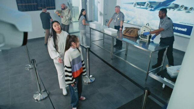 Airport Security Checkpoint: Surveillance Camera with Big Data AI Scanning Technology. Queue of Diverse People Passing Biometric Facial Recognition at Passport Border Control for Boarding Flight.