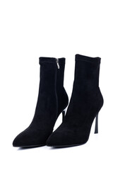 Black women's high-heeled ankle boots isolated on a white background. Women's classic, spring, autumn boots.
