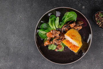 Cordon Bleu Cutlet meat chicken, ham, cheese appetizer dish fresh delicious gourmet food background on the table rustic food top view copy space