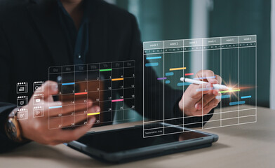 Businessman manage business schedule for efficient work. Virtual screen planner calendar. Work...