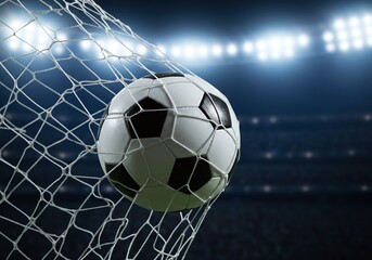 Goal! A dynamic close-up of a soccer ball soaring into the goal net under the bright stadium lights, capturing the moment of victory.